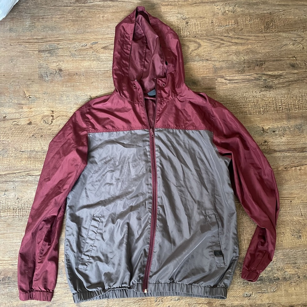 Lightweight, oversized windbreaker perfect for rainy weather
